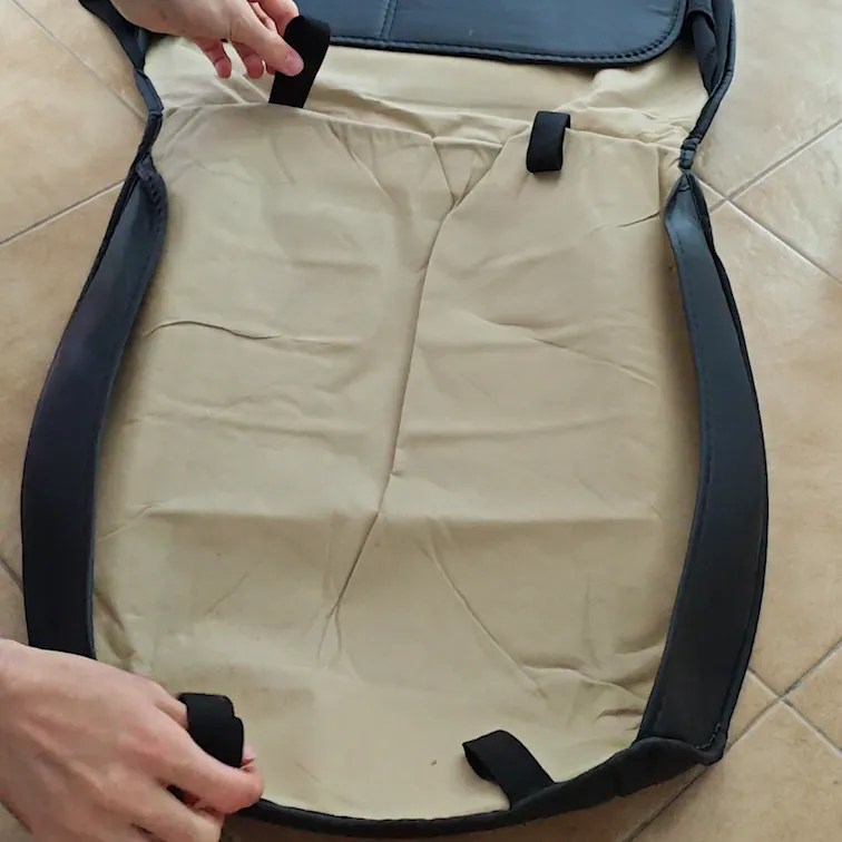 Lay the seat cover flat with the underside facing up